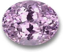楕円形のピンクがかったバイオレットのクンツァイト宝石