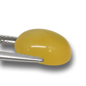 5.47カラットの天然ゴールデンオレンジ瑪瑙、オーバルカット、半透明