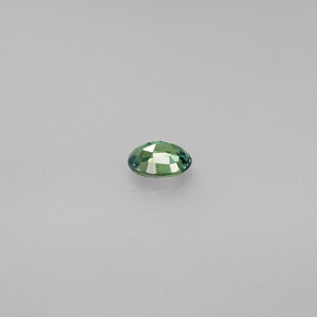 0.26カラットの天然グリーン/レッドアレキサンドライト（4.4×3.4 mm・オーバルカット）