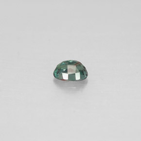 0.12カラットの天然グリーン/レッドアレキサンドライト（3.3×2.5 mm・オーバルカット）