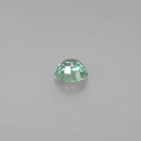 0.14カラットの天然グリーン/レッドアレキサンドライト（3.2×2.8 mm・オーバルカット）