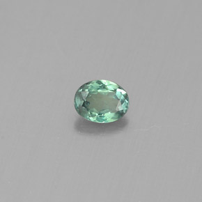 0.13カラットの天然グリーン/レッドアレキサンドライト（3.5×2.7 mm・オーバルカット）