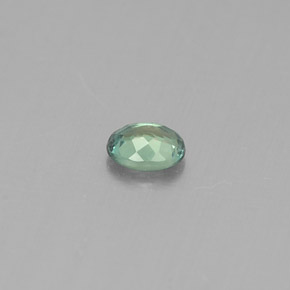 0.13カラットの天然グリーン/レッドアレキサンドライト（3.5×2.7 mm・オーバルカット）