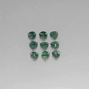 カラットの天然グリーン/レッドアレキサンドライト（3.2×3.1 mm・トリリアント）