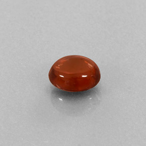 0.76カラットの天然オレンジレッドアルマンディンガーネット（5.8×4.7 mm・透明）