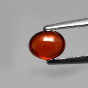 0.88カラットの天然オレンジレッドアルマンディンガーネット（6×4.9 mm・オーバルカット）
