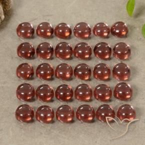 Shop natural 5.61ct 濃いクリムゾンレッド アルマンディンガーネット gems, ラウンド, from マダガスカル at GemSelect. In stock, global shipping!