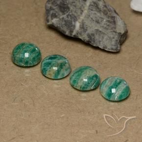 Shop natural 9.77ct パイングリーン アマゾナイト gems, ラウンド, from マダガスカル at GemSelect. In stock, global shipping!