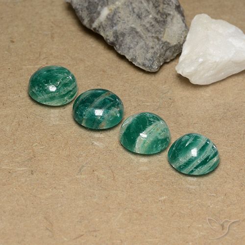 Shop natural 9.50ct ミディアムグリーン アマゾナイト gems, ラウンド, from マダガスカル at GemSelect. In stock, global shipping!