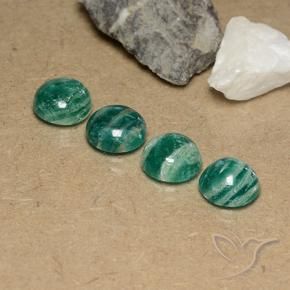 Shop natural 9.50ct ミディアムグリーン アマゾナイト gems, ラウンド, from マダガスカル at GemSelect. In stock, global shipping!