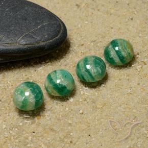 Shop natural 5.75ct ミディアムダークグリーン アマゾナイト gems, ラウンド, from マダガスカル at GemSelect. In stock, global shipping!