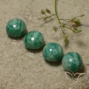 Shop natural 13.10ct ミディアムグリーン アマゾナイト gems, ラウンド, from マダガスカル at GemSelect. In stock, global shipping!