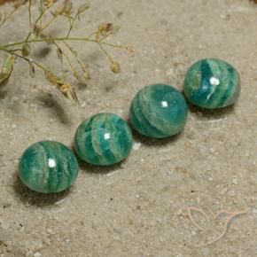 Shop natural 12.60ct ミディアムグリーン アマゾナイト gems, ラウンド, from マダガスカル at GemSelect. In stock, global shipping!