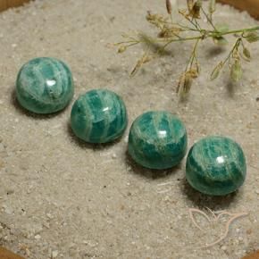 Shop natural 21.00ct ミディアムグリーン アマゾナイト gems, ラウンド, from マダガスカル at GemSelect. In stock, global shipping!