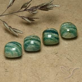 Shop natural 7.99ct ミディアムダークグリーン アマゾナイト gems, クッション, from マダガスカル at GemSelect. In stock, global shipping!
