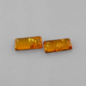 カラットの天然イエローオレンジ琥珀（アンバー）（11.9×6 mm・透明）