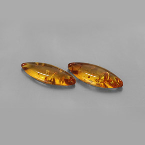 カラットの天然イエローオレンジ琥珀（アンバー）（14.7×5 mm・透明）