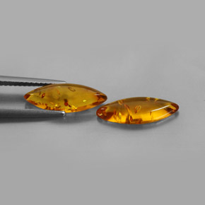 カラットの天然イエローオレンジ琥珀（アンバー）（14.7×5 mm・透明）