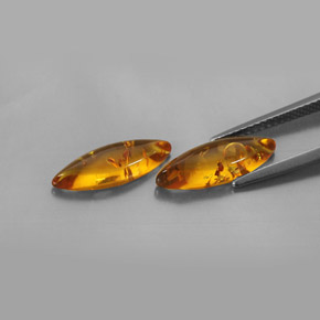 カラットの天然イエローオレンジ琥珀（アンバー）（14.7×5 mm・透明）