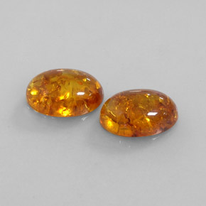 カラットの天然イエローオレンジ琥珀（アンバー）（13.9×9.9 mm・透明）