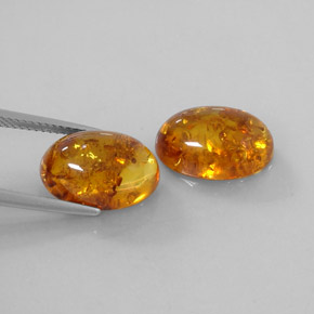カラットの天然イエローオレンジ琥珀（アンバー）（13.9×9.9 mm・透明）