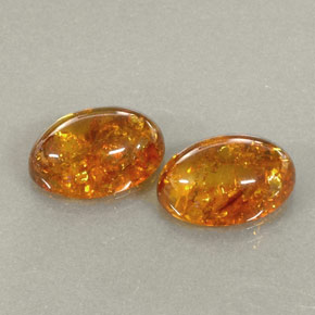 カラットの天然イエローオレンジ琥珀（アンバー）（13.9×9.9 mm・透明）