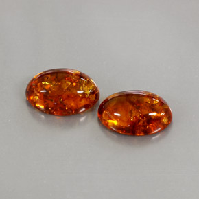 カラットの天然イエローオレンジ琥珀（アンバー）（13.8×9.9 mm・透明）