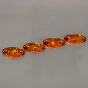 カラットの天然イエローオレンジ琥珀（アンバー）（13×6 mm・透明）