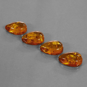 カラットの天然イエローオレンジ琥珀（アンバー）（14.9×10 mm・透明）