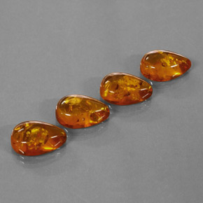 カラットの天然イエローオレンジ琥珀（アンバー）（14.9×10 mm・透明）