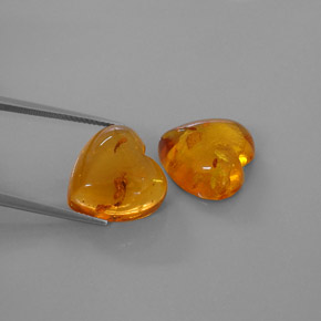 カラットの天然イエローオレンジ琥珀（アンバー）（15.9×15.8 mm・透明）