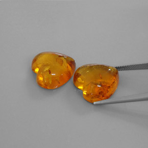 カラットの天然イエローオレンジ琥珀（アンバー）（15.9×15.8 mm・透明）
