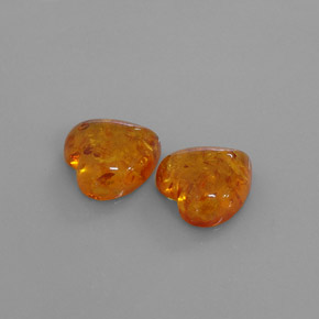 カラットの天然イエローオレンジ琥珀（アンバー）（15.8×15.7 mm・透明）