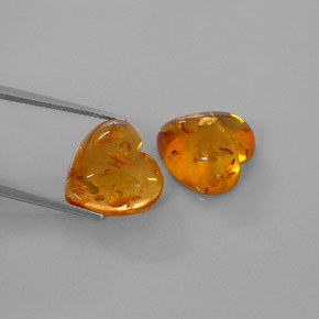カラットの天然イエローオレンジ琥珀（アンバー）（16×15.8 mm・透明）