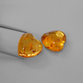 カラットの天然イエローオレンジ琥珀（アンバー）（16.1×15.8 mm・透明）