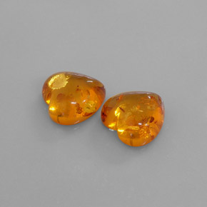 カラットの天然イエローオレンジ琥珀（アンバー）（16.1×15.8 mm・透明）