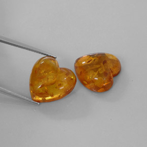 カラットの天然イエローオレンジ琥珀（アンバー）（15.7×15.7 mm・透明）