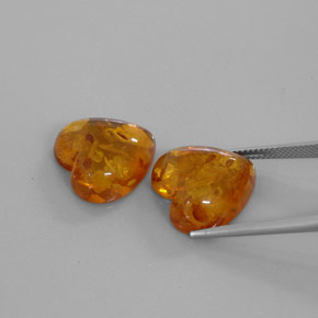 カラットの天然イエローオレンジ琥珀（アンバー）（15.7×15.7 mm・透明）