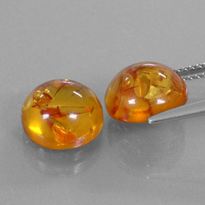 カラットの天然イエローオレンジ琥珀（アンバー）（9.42 mm・透明）