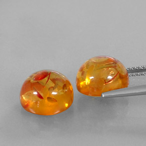 カラットの天然イエローオレンジ琥珀（アンバー）（9.56 mm・透明）