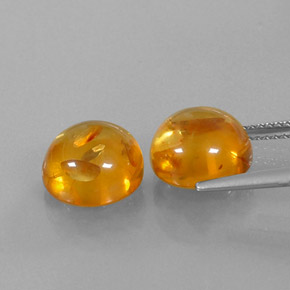 カラットの天然イエローオレンジ琥珀（アンバー）（9.54 mm・透明）