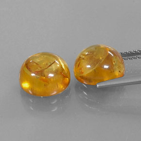 カラットの天然イエローオレンジ琥珀（アンバー）（9.58 mm・透明）