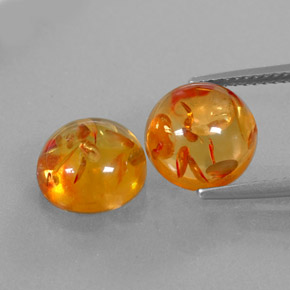 カラットの天然イエローオレンジ琥珀（アンバー）（9.56 mm・透明）