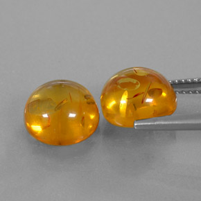 カラットの天然イエローオレンジ琥珀（アンバー）（9.55 mm・透明）