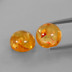 カラットの天然イエローオレンジ琥珀（アンバー）（9.58 mm・透明）