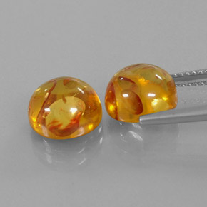 カラットの天然イエローオレンジ琥珀（アンバー）（9.48 mm・透明）