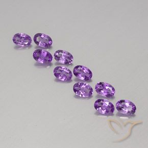 Shop natural 3.97ct ミディアムダークパープルがかったバイオレット アメジスト gems, 楕円形, from ブラジル at GemSelect. In stock, global shipping!