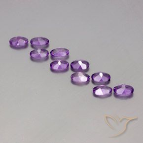 Shop natural 3.84ct ミディアムダークパープルがかったバイオレット アメジスト gems, 楕円形, from ブラジル at GemSelect. In stock, global shipping!