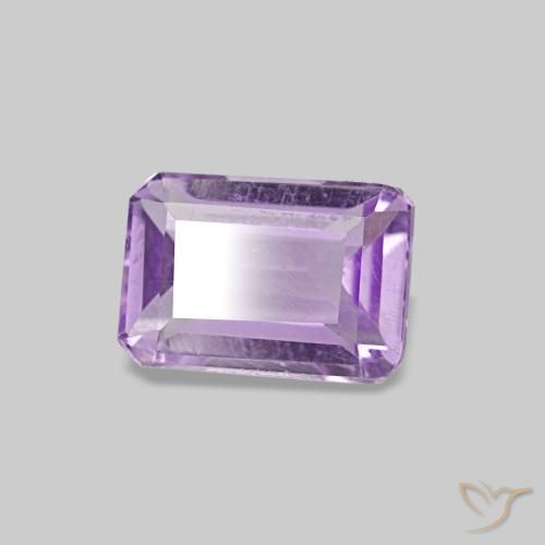 0.55カラットの天然ミディアムバイオレットアメジスト（6x4.2 mm・エメラルドカット）