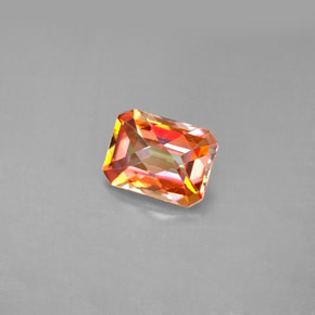 1.85カラットの天然マルチカラーアゾティックトパーズ（8×6 mm・エメラルドカット）